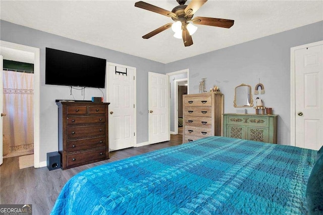 bedroom with ceiling fan and hardwood / wood-style floors