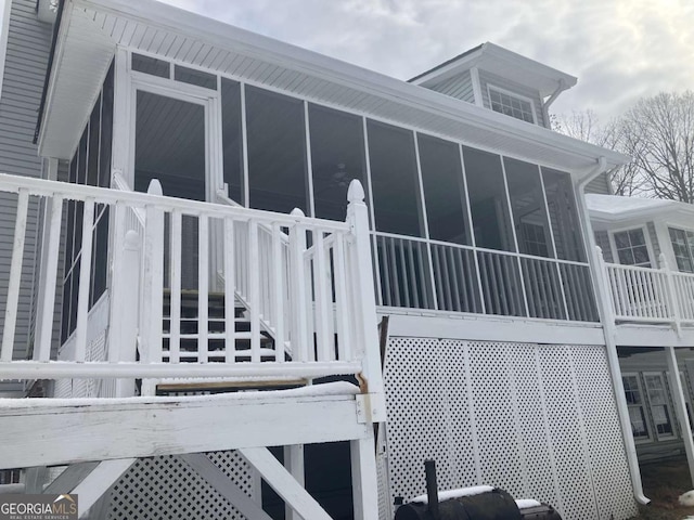 view of home's exterior featuring a sunroom