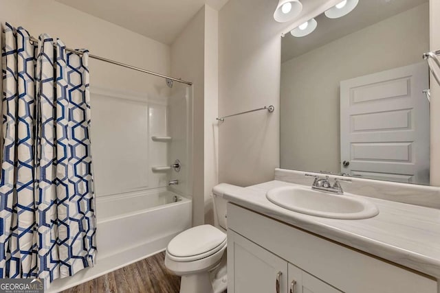 full bathroom with toilet, shower / tub combo with curtain, vanity, and wood-type flooring