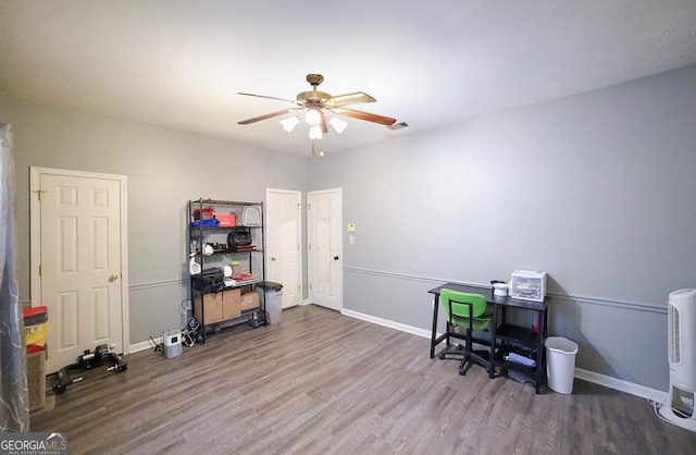 home office featuring ceiling fan and hardwood / wood-style floors