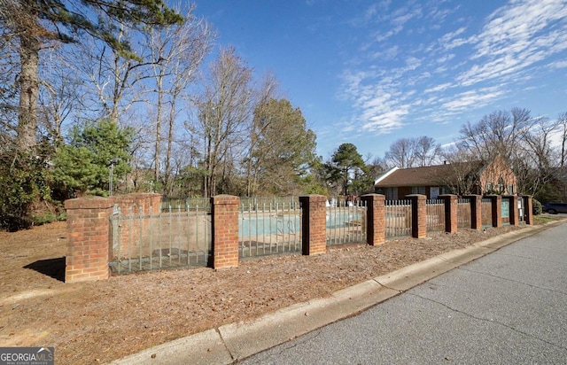 exterior space featuring a covered pool