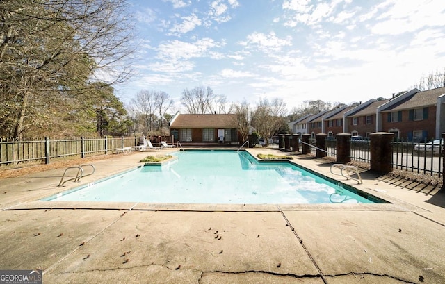 view of pool featuring a patio