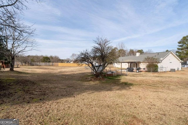 view of yard featuring central AC