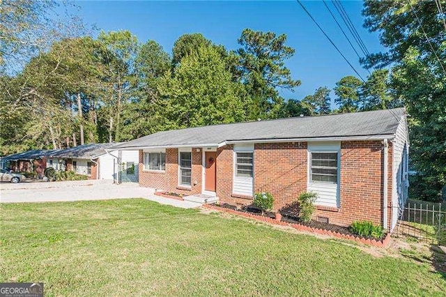 single story home with a front yard