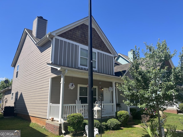 exterior space with a yard and a porch