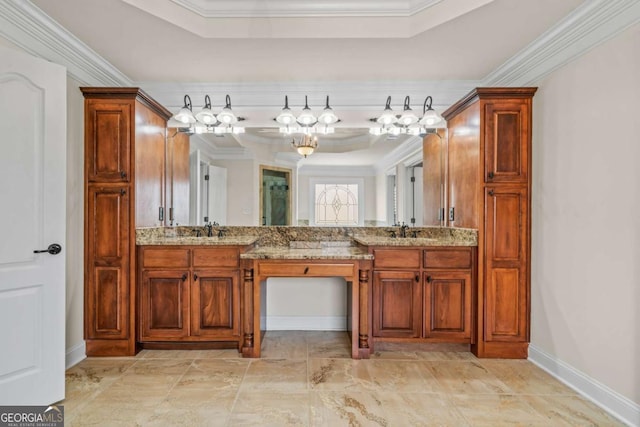 bathroom featuring crown molding, vanity, and a tray ceiling