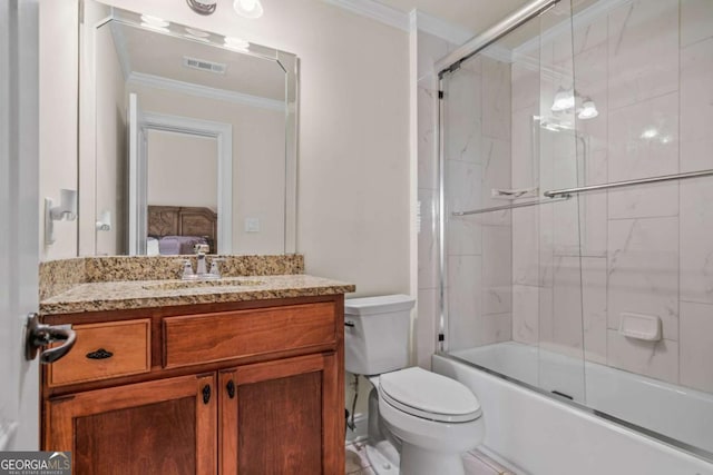 full bathroom featuring enclosed tub / shower combo, ornamental molding, toilet, and vanity