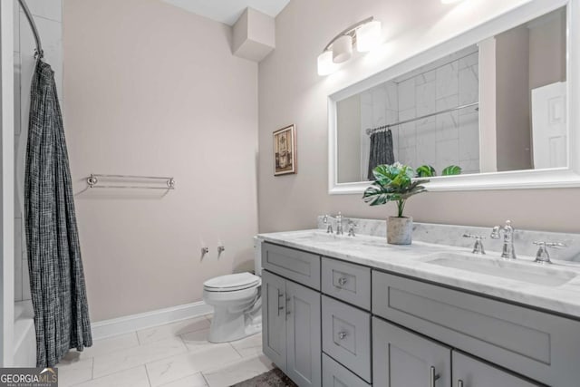 full bathroom featuring vanity, shower / tub combo with curtain, and toilet