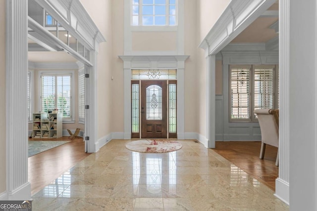 foyer entrance with ornamental molding