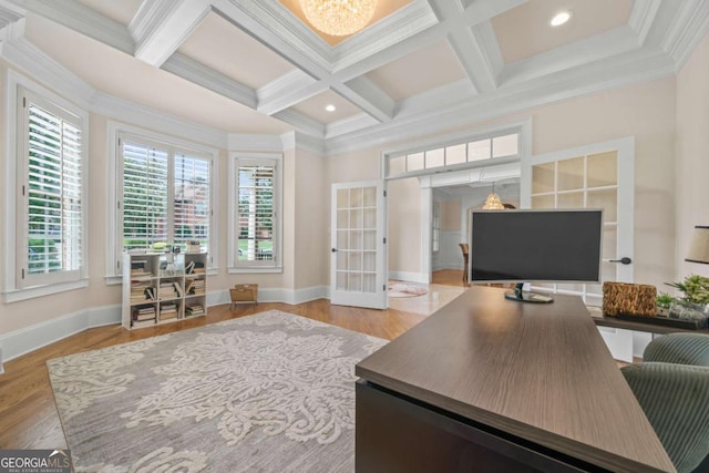 office area featuring french doors, coffered ceiling, crown molding, light wood-type flooring, and beamed ceiling