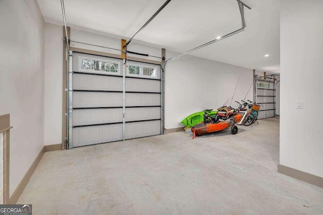 garage featuring baseboards