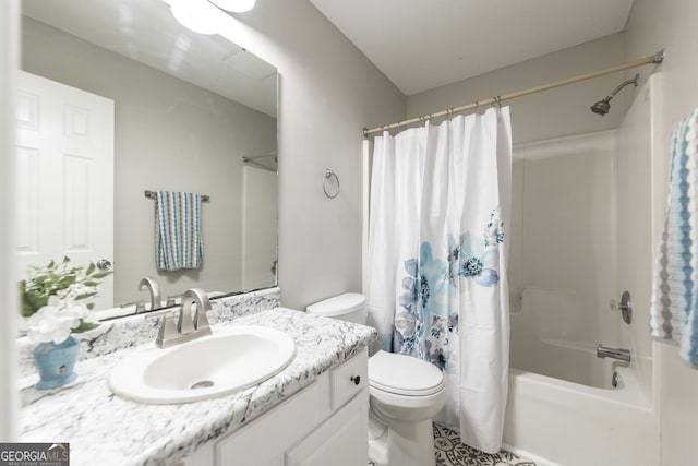 full bathroom with shower / tub combo, vanity, and toilet