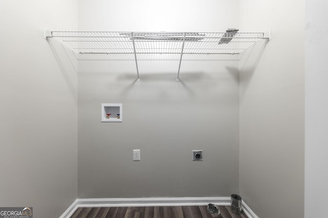 washroom featuring hookup for an electric dryer, hookup for a washing machine, and dark hardwood / wood-style floors