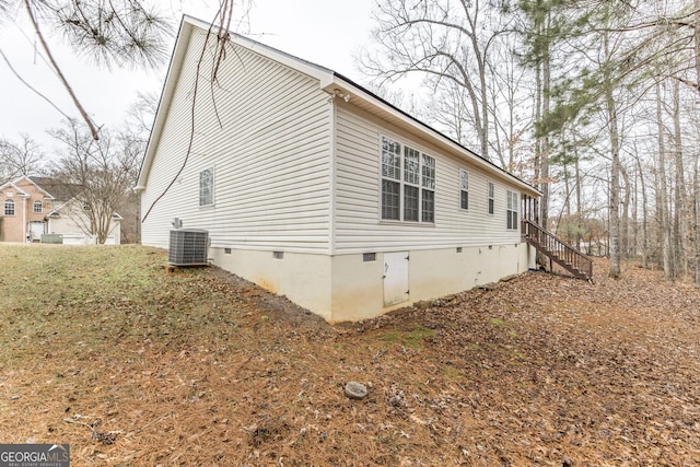 view of property exterior with central air condition unit