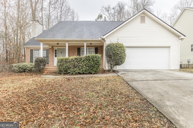 single story home with a garage