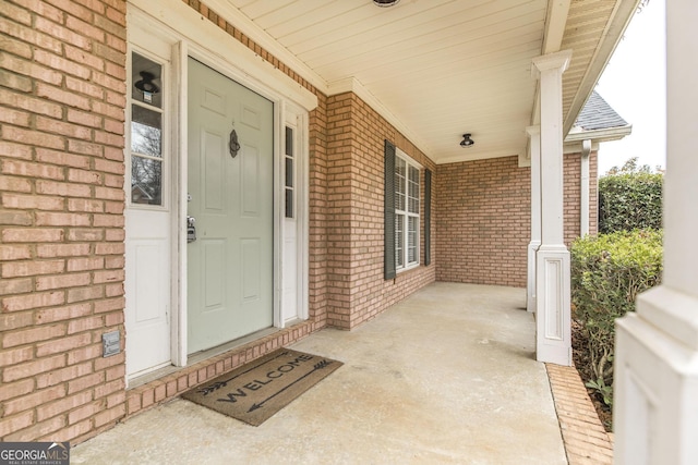 property entrance featuring a porch