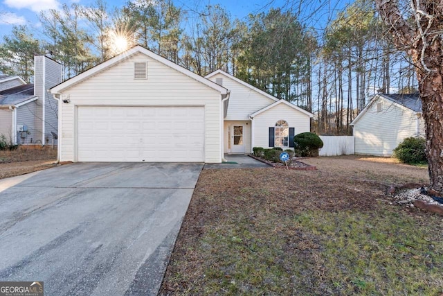 view of front of property featuring a garage