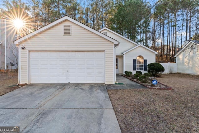 single story home with a garage