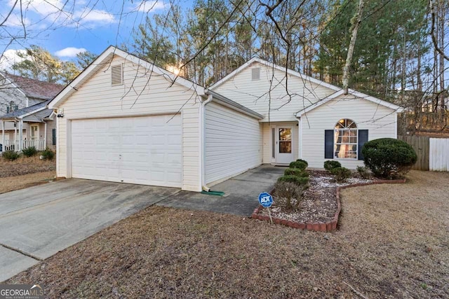 view of front of home with a garage