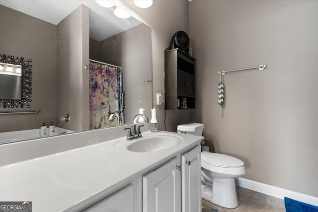 bathroom with toilet, tile patterned flooring, and vanity