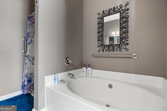 bathroom featuring a washtub