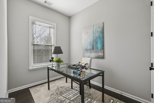 office area featuring dark wood-type flooring