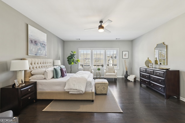 bedroom featuring dark hardwood / wood-style floors and ceiling fan