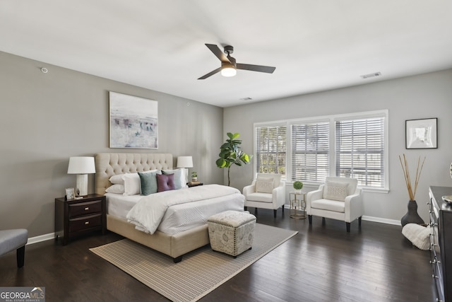 bedroom featuring ceiling fan and dark hardwood / wood-style flooring