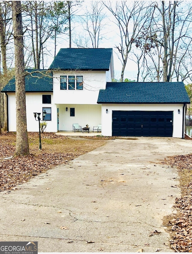 front of property with a garage