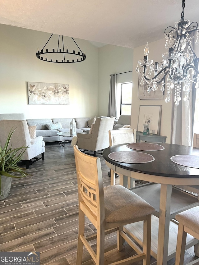 dining space with a chandelier