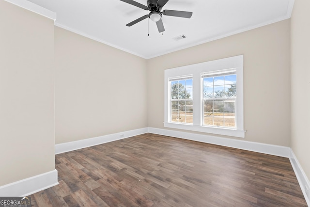 unfurnished room featuring ornamental molding, dark hardwood / wood-style flooring, and ceiling fan