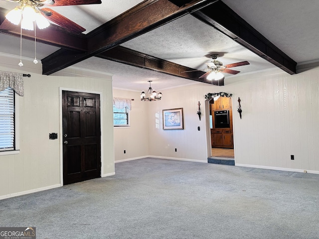 interior space featuring a textured ceiling, ceiling fan with notable chandelier, carpet, and beam ceiling