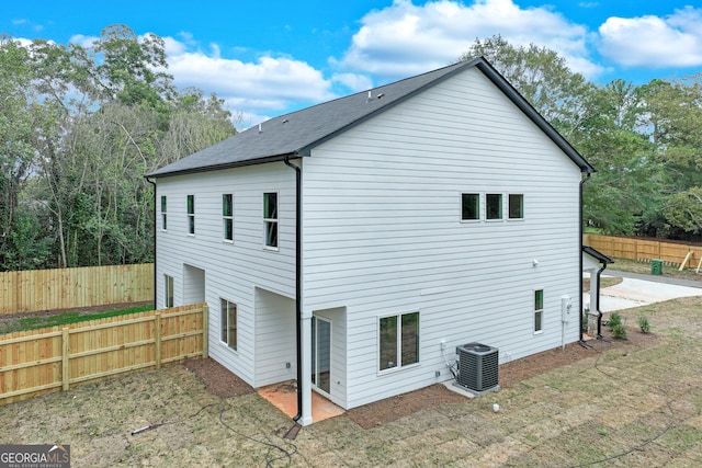 back of house featuring central AC and a patio