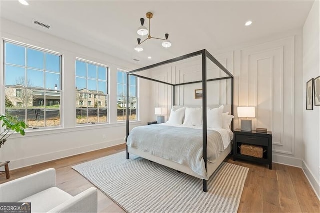 bedroom featuring light wood-type flooring