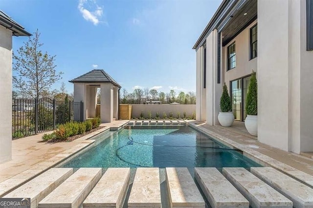 view of pool with a patio area