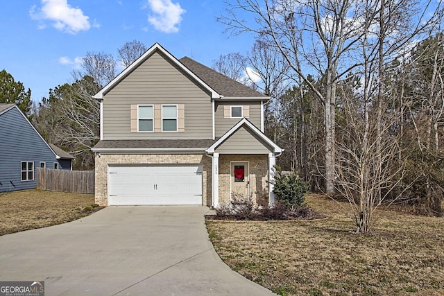 view of front property featuring a front yard and a garage