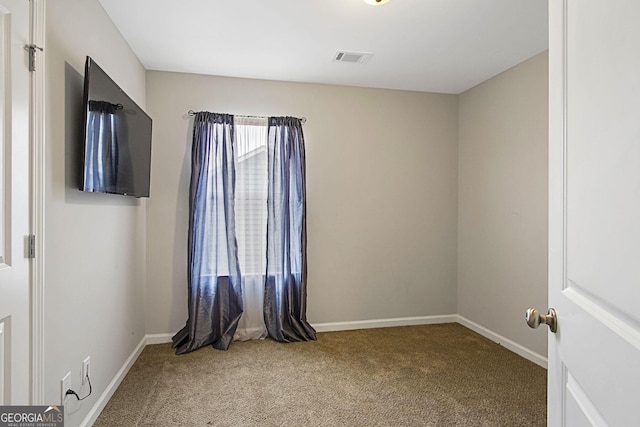 view of carpeted spare room