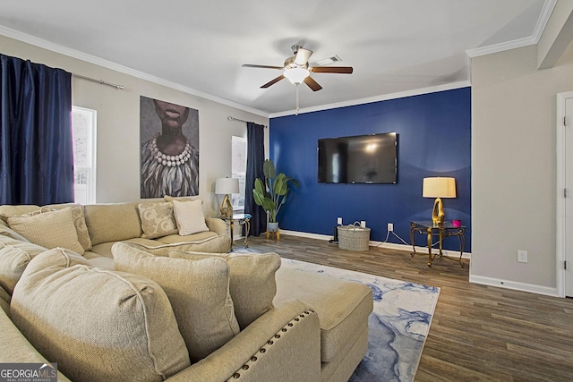 living room with dark wood-type flooring, ceiling fan, and ornamental molding