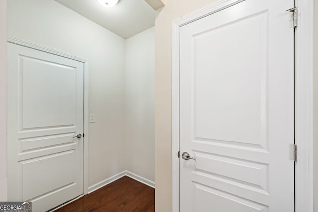 interior space with dark hardwood / wood-style flooring