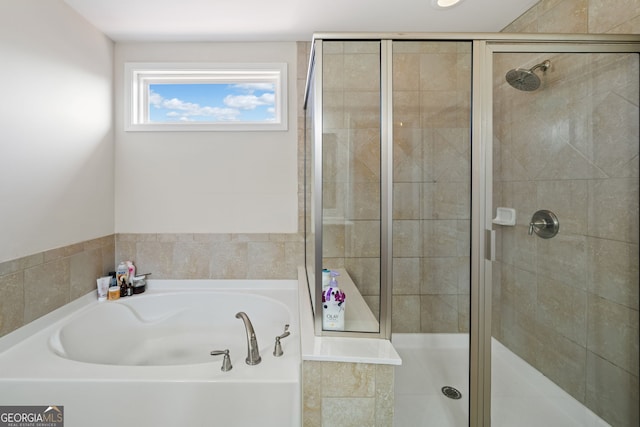 bathroom with independent shower and bath