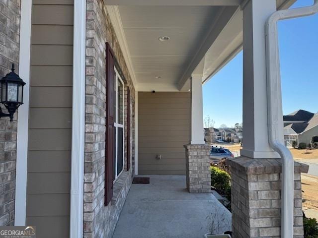 view of patio featuring a porch