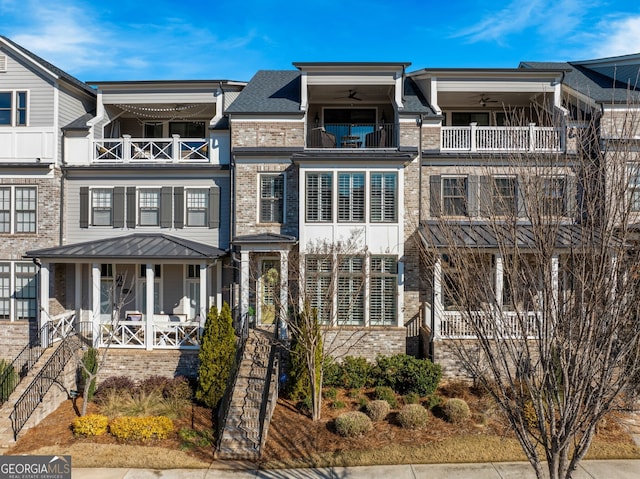 view of front of property with covered porch and ceiling fan