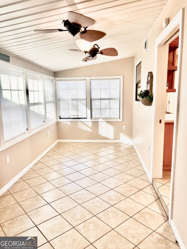 unfurnished sunroom with vaulted ceiling, ceiling fan, and wooden ceiling