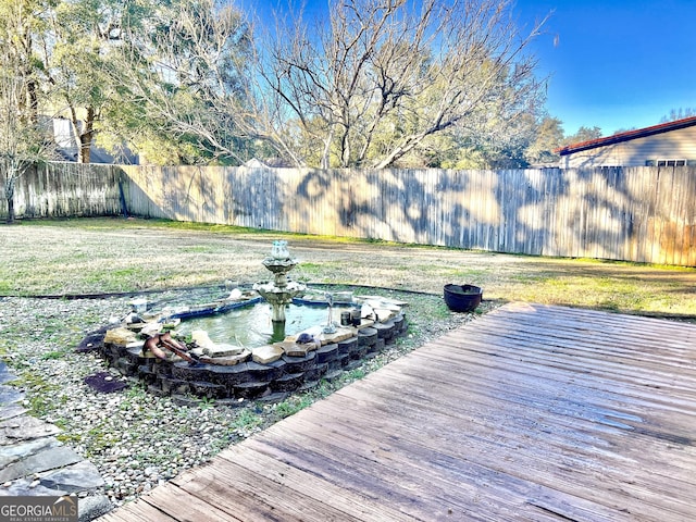 view of yard featuring a deck