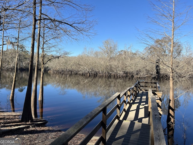 view of dock with a water view