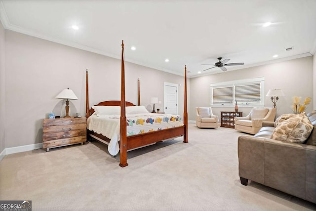 carpeted bedroom featuring ceiling fan and crown molding