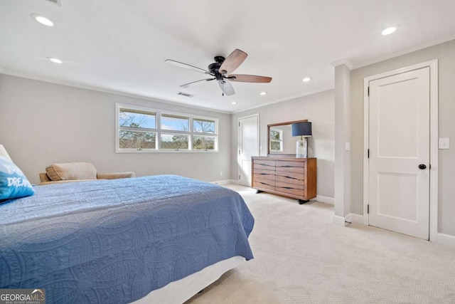 bedroom with ornamental molding, ceiling fan, and light carpet