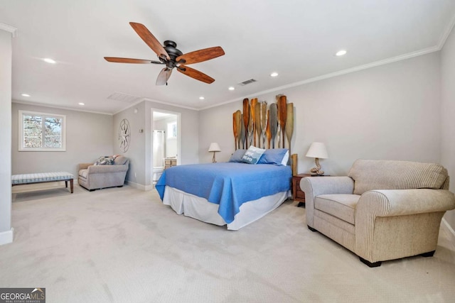 carpeted bedroom with ceiling fan and ornamental molding