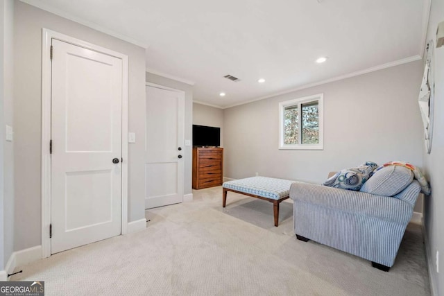 carpeted living room featuring ornamental molding