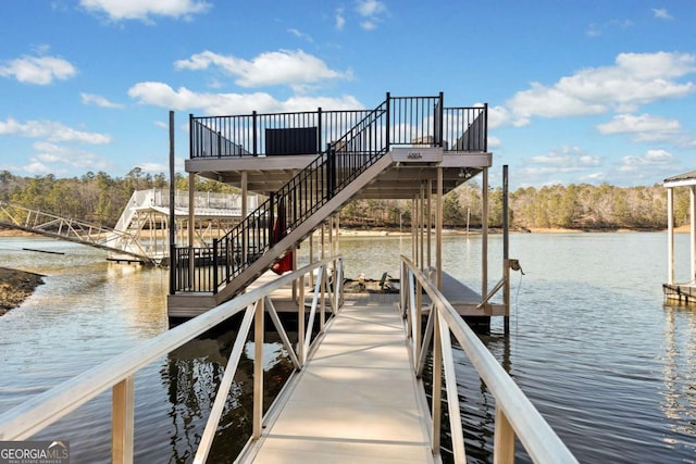 view of dock with a water view